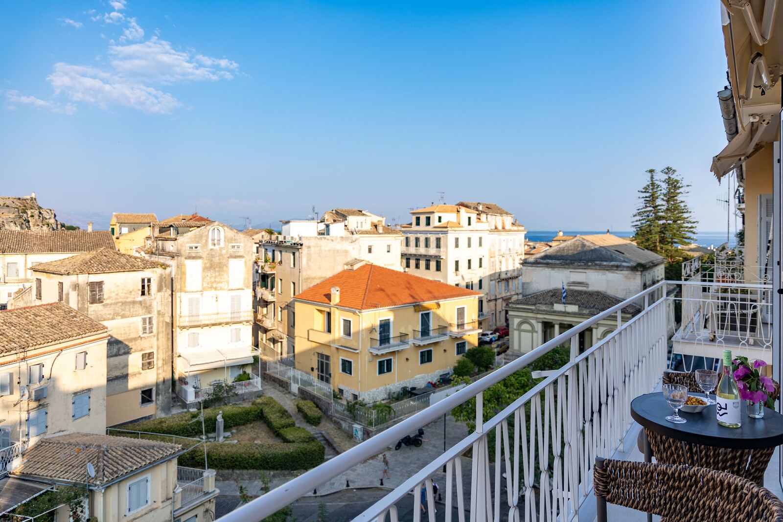 Rattan chairs on the balcony overlooking the Venetian rooftops