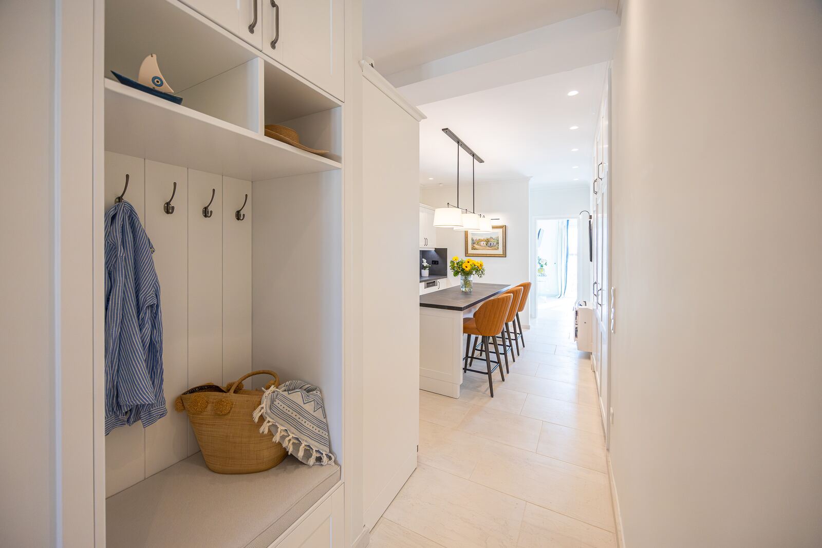 Entrance hall with fitted coat cupboard